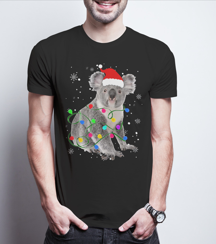 Koala Wrapped In Christmas Lights Wearing Santa Hat With Snowflakes Matching Fam T-Shirt