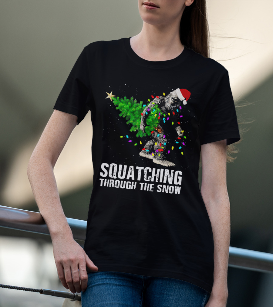 Squatching Through The Snow Bigfoot Christmas Lights Santa Hat T-Shirt