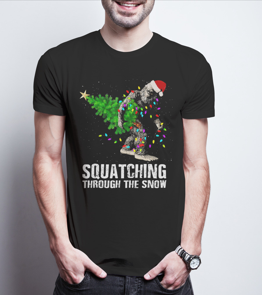Squatching Through The Snow Bigfoot Christmas Lights Santa Hat T-Shirt