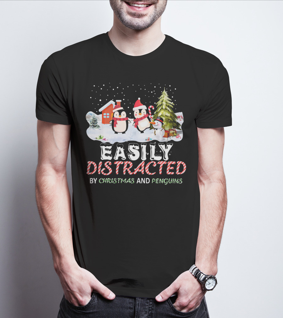 Easily Distracted By Christmas And Penguins In Winter Wonderland With Snowman House And Tree T-Shirt