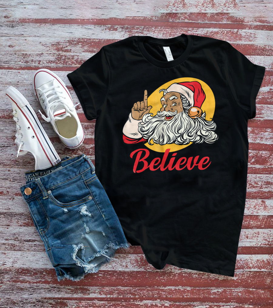 Black Santa Claus With Believe Caption And Yellow Background T-Shirt