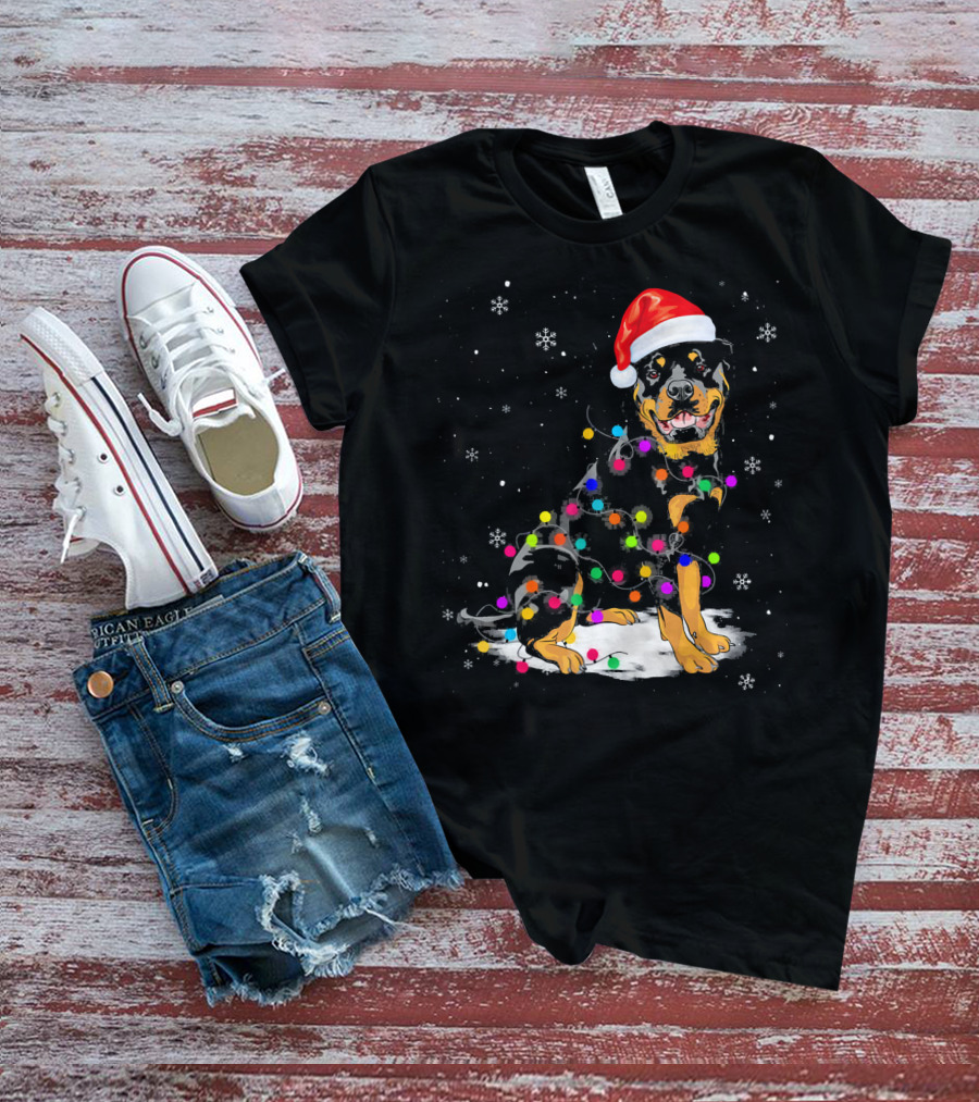 Rottweiler With Santa Hat And Colorful Christmas Lights In Snowy Scene T-Shirt
