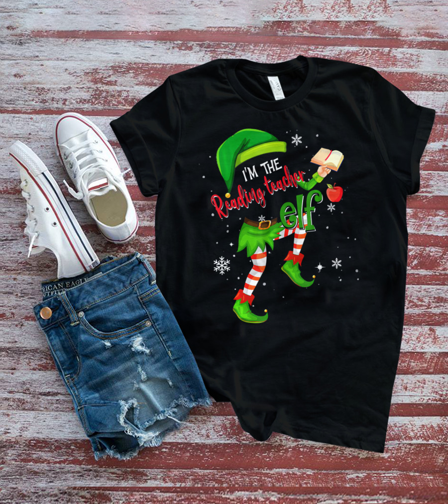 I'm The Reading Teacher Elf Holding Book Apple Wearing Elf Outfit Snowflakes T-Shirt