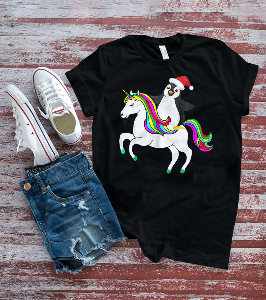 Penguin In Santa Hat Riding A Rainbow Unicorn T-Shirt