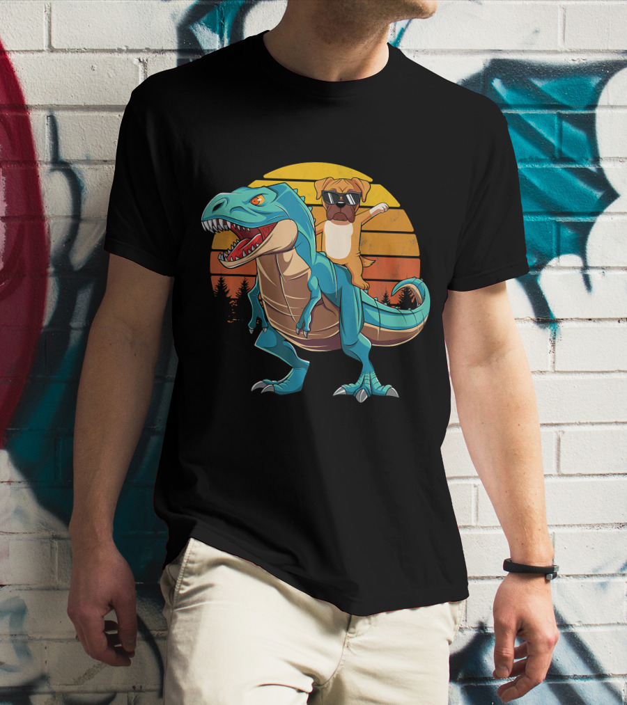 Boxer Dog With Sunglasses Riding Blue T-Rex Against Sunset Background T-Shirt